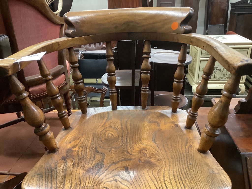 A Victorian elm and beech smoker's bow chair